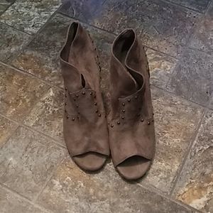 Taupe colored faux suede booties.